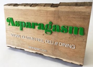 Oak and laser cut acrylic bespoke sign for Asaparagasm.