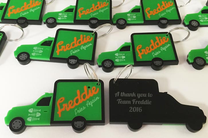 laser cut acrylic key rings for Freddie Fries Again crew corporate gifts