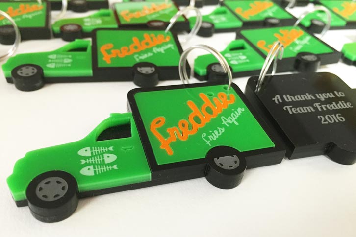 laser cut acrylic key rings for Freddie Fries Again crew corporate gifts