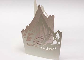 Laser cut card wedding invites.