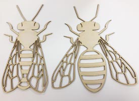 Intricate laser cutting of plywood bees from 3mm ply.