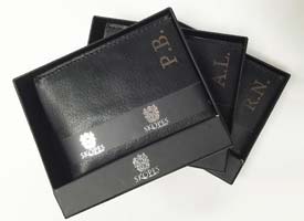 laser-engraved-leather-personalised-gifts Leather engraving on wallets with buiness logo.