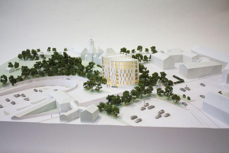 We are an architectual model maker, this is a 1:200 white architectural model of a flat development from laser cut acrylic.