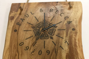 Solid oak, engraved wood clock.