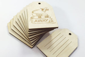 Laser engraved plywood luggage tags