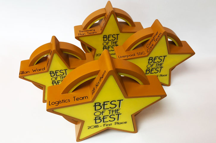 Different size personalised bespoke trophies for Allied Bakery, made using CNC milling.