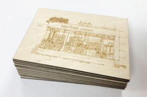Laser engraved plywood inviations for Bamford.