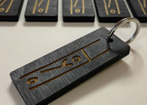 Laser cut and engraved wood bespoke keyrings.