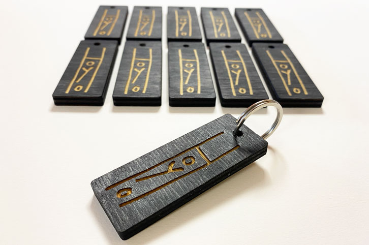 Laser cut and engraved wood bespoke keyrings.