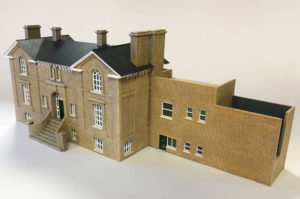 Harleston Station building model made of laser cut, etched and painted acrylic.