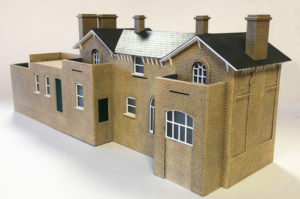 The back of Harleston Station building model made of laser cut, etched and painted acrylic.
