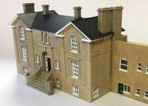 Close up of Harleston railway station model made from laser cut, etched and painted acrylic.