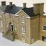 Close up of Harleston railway station model made from laser cut, etched and painted acrylic.