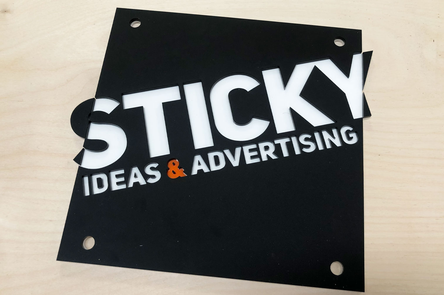 Acrylic office signs from layers of acrylic.