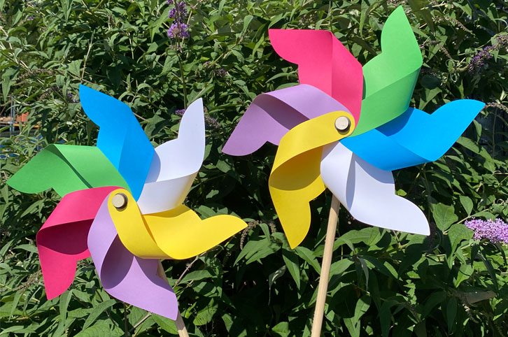 Giant spinning pinwheels made from card.