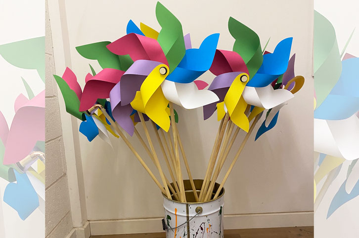 Giant spinning pinwheels made from card.