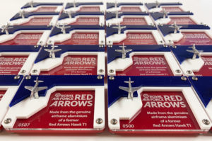 Laser cut acrylic display stands for Icarus Originals. Red Arrow recycled aluminium.
