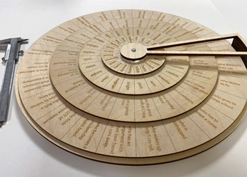 Laser cut plywood story spinner