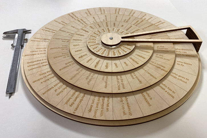 Laser cut plywood story spinner