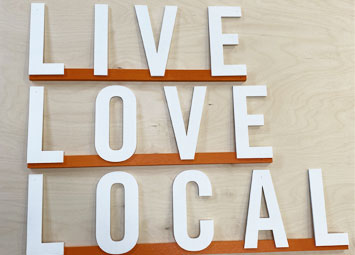 Live Love Local sign for Daylesford Organic farm. large wood letters.