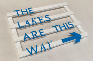Wood signs for a farmshop display.