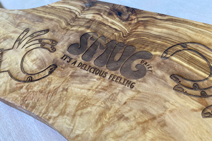 Laser engraved wood chopping board engraving.