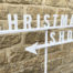 Christmas directional signage, painted wood signs.